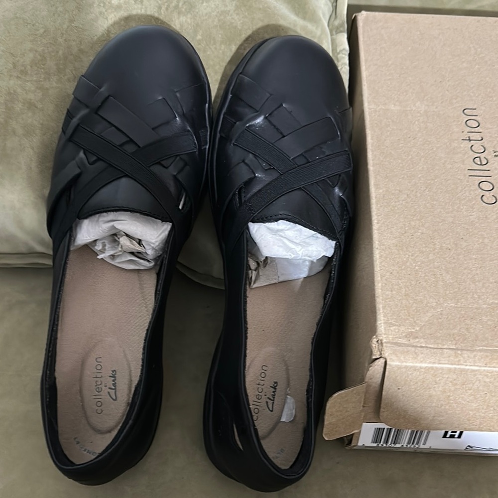 Clarks Black Flats & Loafers Elegant Comfort